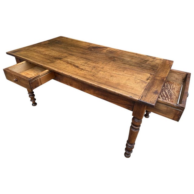 Magnificent Louis Philippe farmhouse table in walnut. 2 drawer legs. 19th century. Height under crosspiece 60
