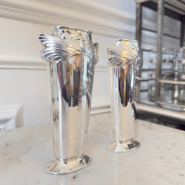 Introducing this pair of Vintage Christofle Art Nouveau Silverplate Dragonfly Vases: a captivating treasure that...