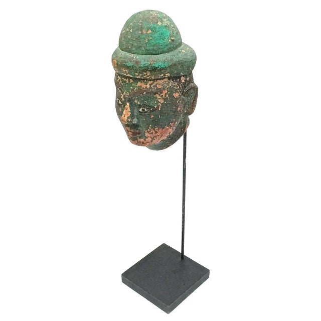 Antique carved wooden Burmese puppet head sculpture affixed to metal display stand. No maker's marks. Head, 4.5"L x 5"W x...