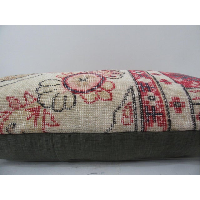 This is a pillow cover made from a vintage kilim rug. The piece was properly washed and ready to use. Pillow inserts not...