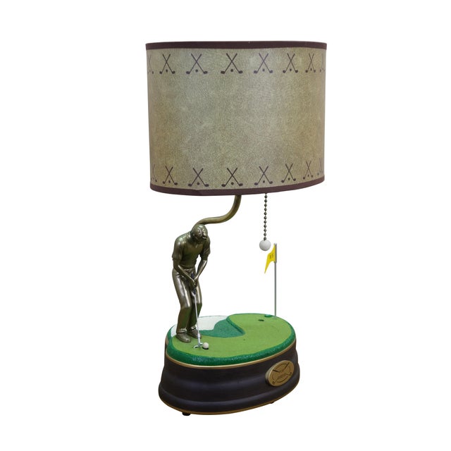 Vintage King America For Birdie animated golf lamp. Produced during the 1990s, this collectible table lamp features an...