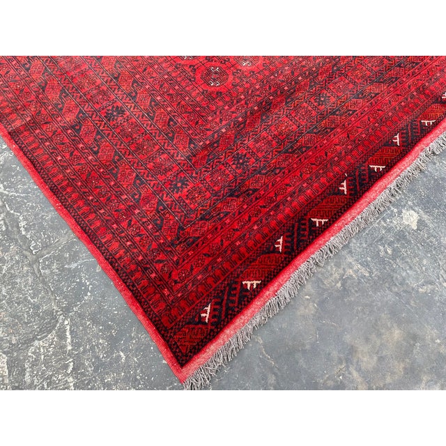 The Afghan Turkoman rug is hand-knotted and 100% wool, This Afghan Turkoman rug will enhance your home's style. This rug...