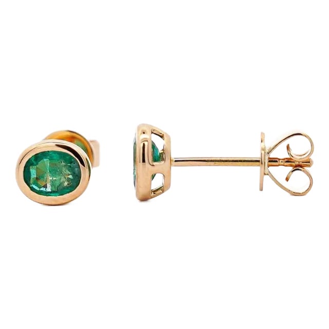 0.50 Carat Oval Emerald Bezel Set 18k Gold Stud Earrings, A Pair For Sale