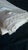 A beautiful antique French rectangular pillowcase in soft white cotton, featuring delicate hand-crocheted lace along both...