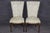 An exquisite set of eight French Louis XVI Style dining chairs, masterfully crafted to embody the timeless elegance and...