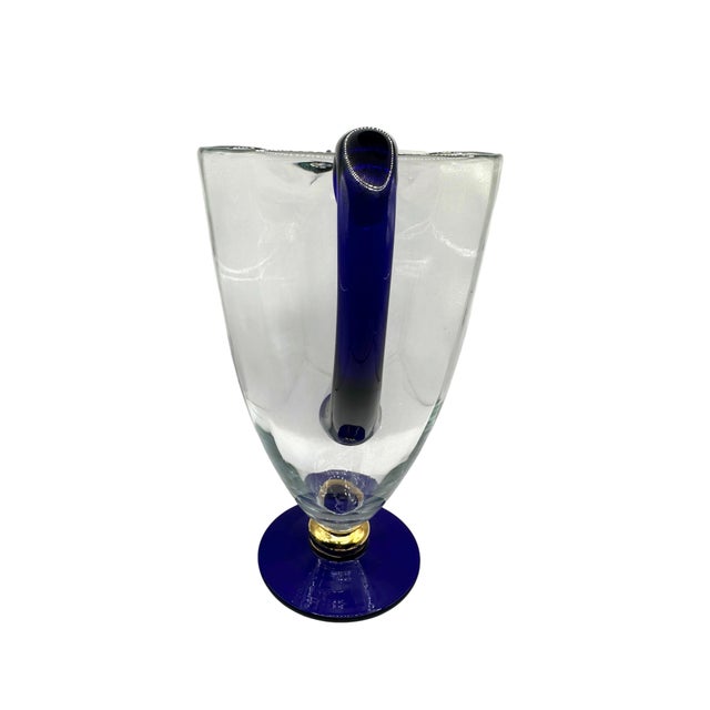 This is a stunning vintage Romanian crystal pitcher. Expertly handcrafted, this piece features a heavy, crystal-clear...