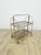 For sale: an exceptionally elegant and rare folding bar cart (serving trolley) from the 1960s. This piece epitomizes the...