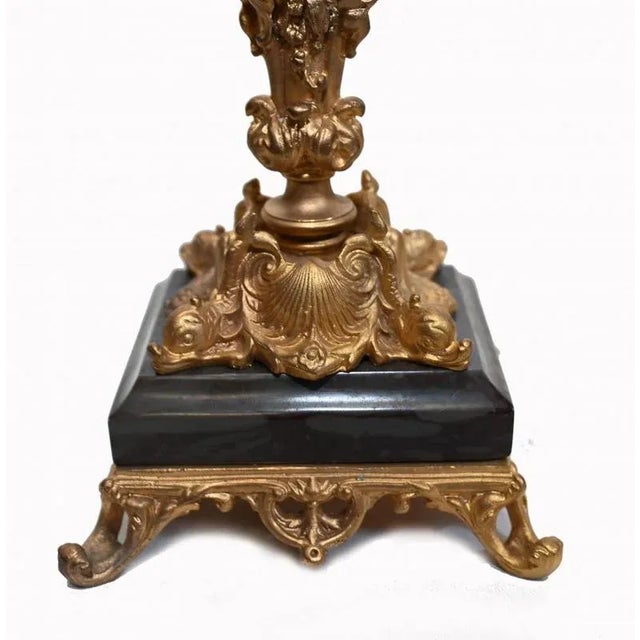You are viewing a gorgeous French centerpiece in the Regency manner Hand crafted from black marble with gilt fixtures The...
