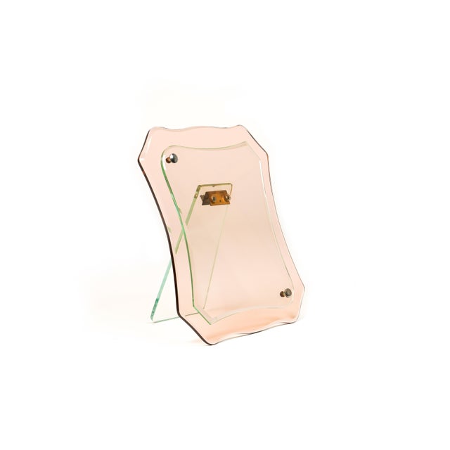 Midcentury Amazing picture frame in pink glass attributed to Cristal Arte. Made in Italy in the 1960s. Perfect desk object...