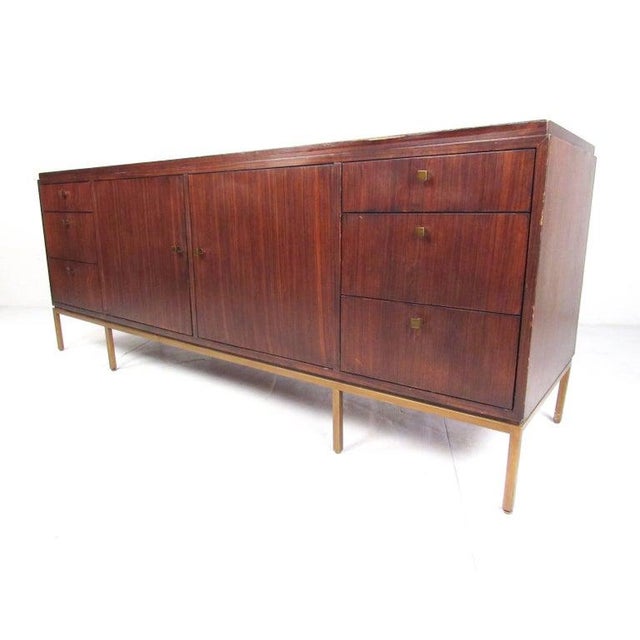 Beautiful Mid-Century Modern style sideboard features plenty of room for storage within its six large drawers and four...