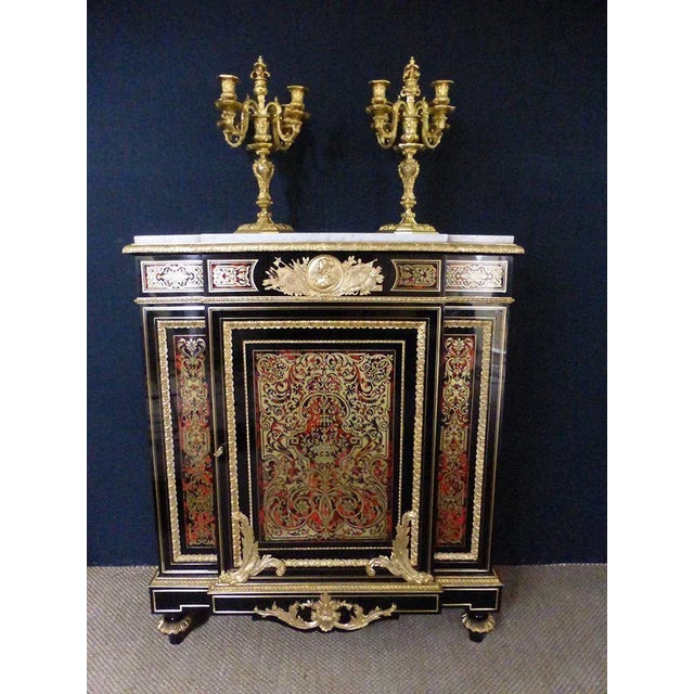 Superb buffet in marquetry boulle from the Napoleon III period. This piece of furniture is of a rare quality of...