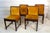 Four beautiful beech chairs upholstered in a precious gold-colored silk velvet. The structure is in the tone of a...