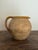 An antique French stoneware jug from the 19th century, hand-thrown in the tradition of everyday French farmhouse pottery....