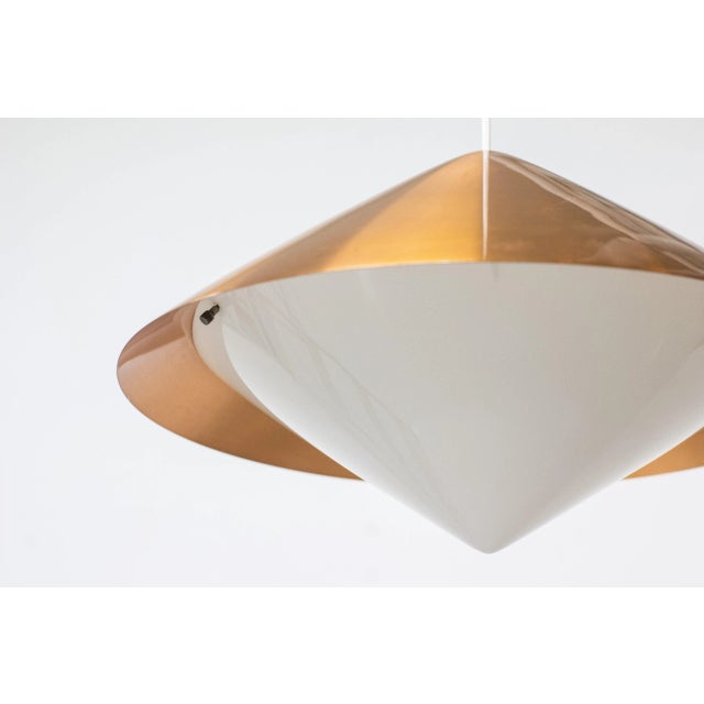 Ceiling light designed by Svea Winkler. Produced in Finland by Orno. Copper metal shade and acrylic diffuser. Good vintage...