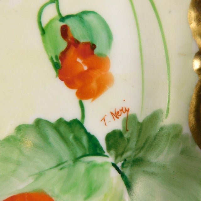 This is a hand painted Richard Ginori platter with orange and pink poppies and gold trim. The platter is signed as shown....