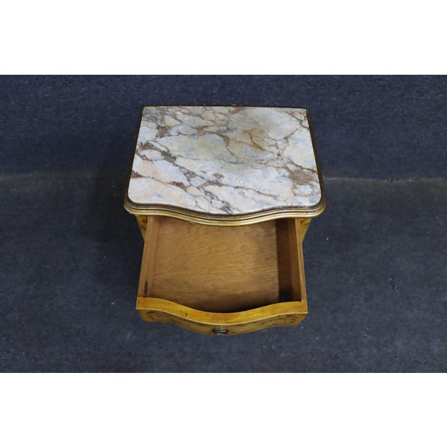 Italian-style nightstand by NY Galleries, featuring a mustard-yellow painted finish with hand-painted floral motifs and...