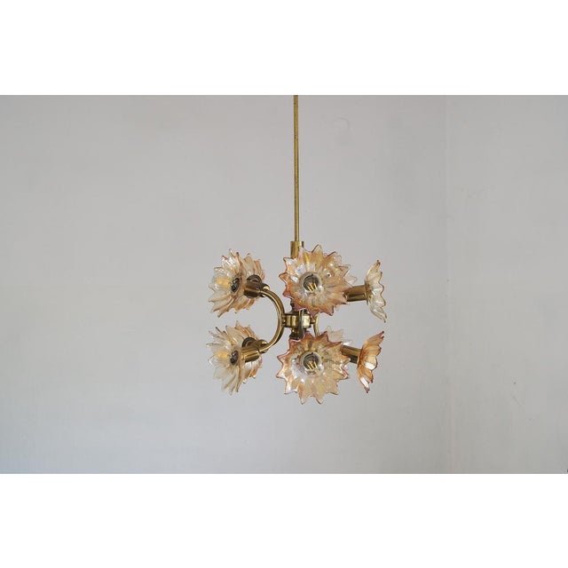 This chandelier is from the German company Sische Lighting. A decorative lamp with a beautiful design - simply unique....