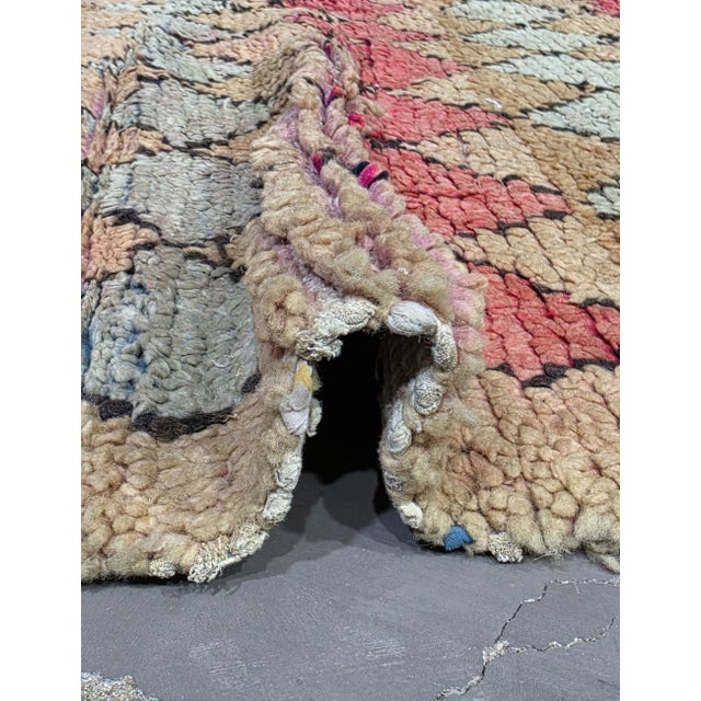 Vintage Boujad Rug | Handwoven Berber Wool Rug with Tan Field and Diamond Lattice Pattern This lively vintage rug features...