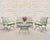 A charming mid-century French Provincial garden or patio table crafted out of wrought iron and glass by O. W. Lee,...