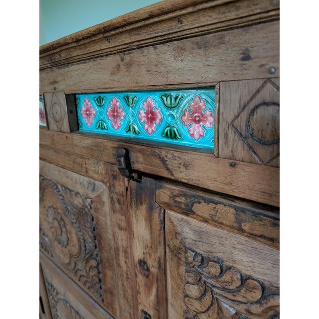 Stunning Antique Indonesian Carved Teakwood Cabinet With Majolica Ceramic Tiles For Sale - Image 12 of 14