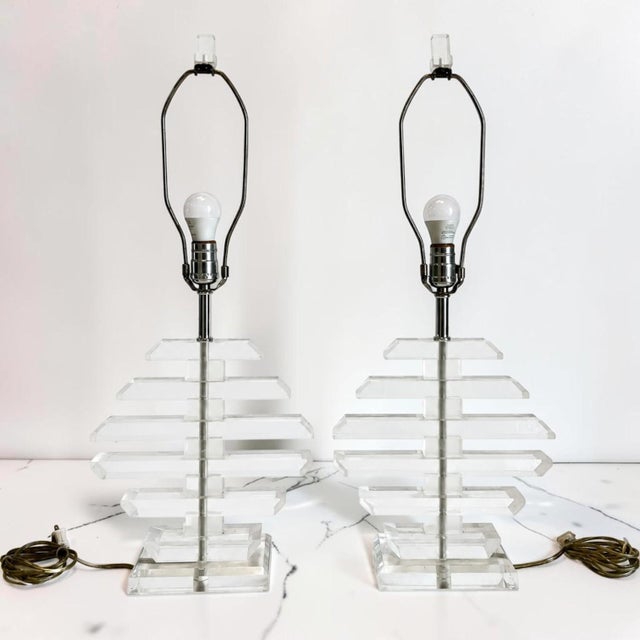 Beautiful pair of vintage 1970s multilayer lucite table lamps. Thick pieces of lucite making a diamond shape. Perfect...