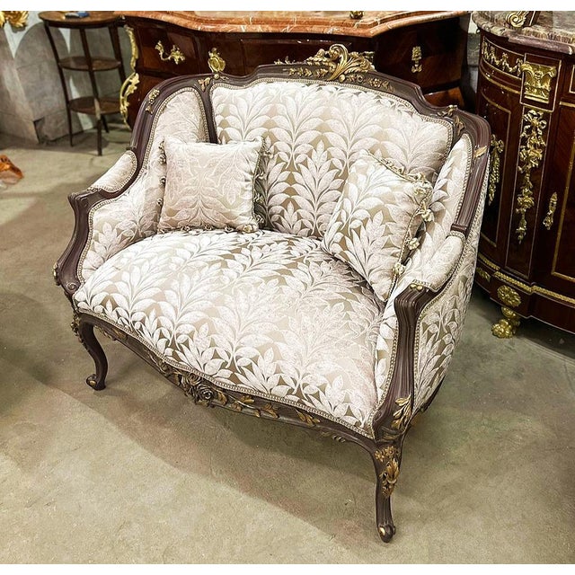 Stunning details. The sofa comes with 2 pillows. Beautiful sofa with gold details and antique white and gold upholstery....