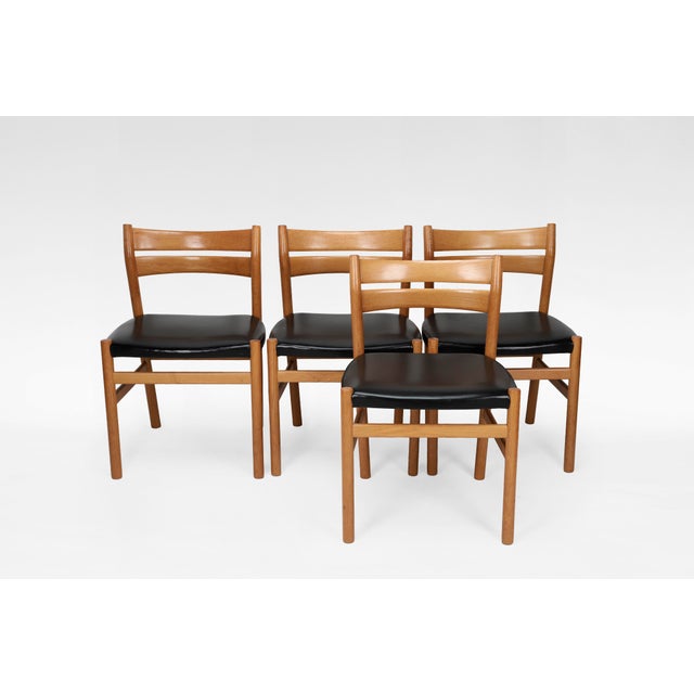 A vintage set of four bm1 dining chairs by børge mogensen for c.m. Madsen, crafted in denmark during the 1950s. Featuring...