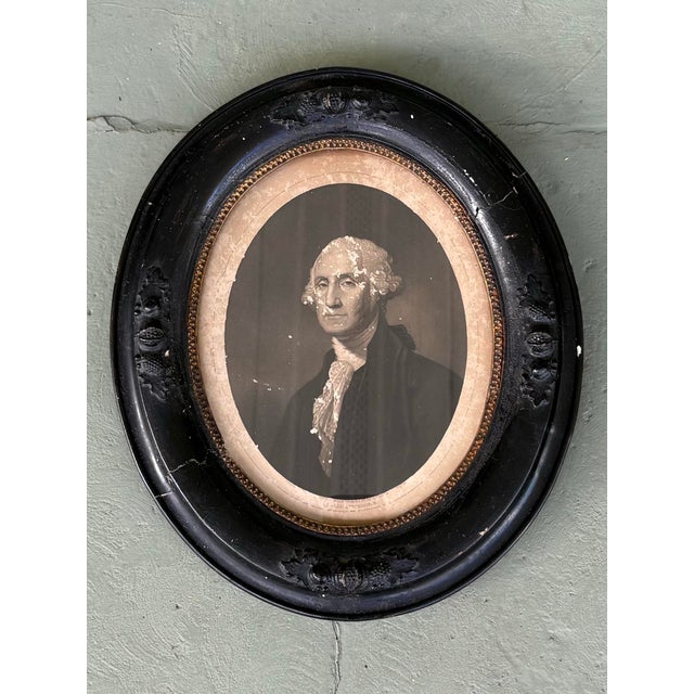 This elegant matched set of two antique oval portrait prints depicts George and Martha Washington, after original...