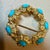 3 Carat Sleeping Beauty Turquoise Circular Pin in 18 Kt Yellow Gold , Estate For Sale In New York - Image 6 of 8