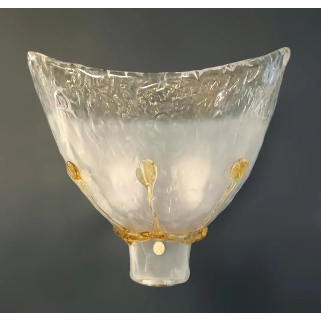 Italian wall light with frosted Murano glass shade decorated with amber details mounted on black metal structure / Made in...