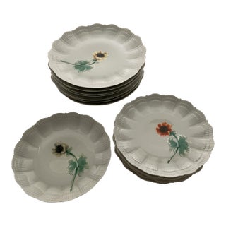 Vintage One-of-a-Kind Set of 13 Different Rocaille Shape Plates Hand-Painted by Le Chambrelain With Different Tones Anémones. For Sale