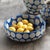In a nod to midcentury pottery, this fun, fashion statement makes a memorable centerpiece. Fill with mood moss or...