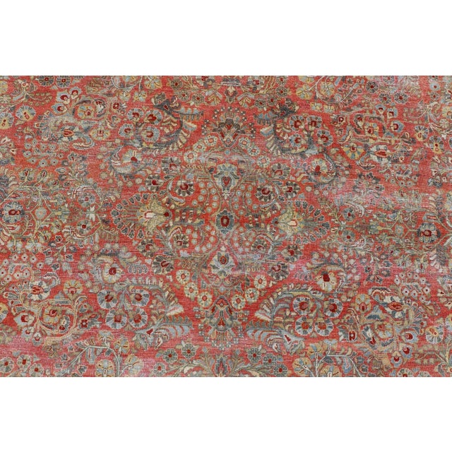 Textile Early 20th Century Antique Persian Sarouk With All-Over Floral Design on a Light Red Field For Sale - Image 7 of 13