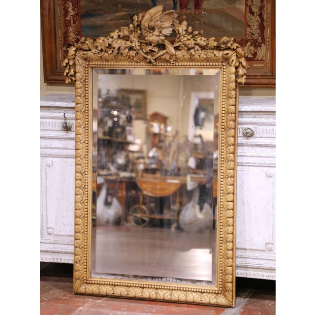 Decorate an entry, powder room, or above a console with this exceptional antique Black Forest wall mirror. Crafted in...