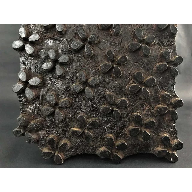 Wooden pad with trefoil patterns used to decorate fabrics. India, early 20th century.