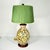 We absolutely love this table lamp. It starts either its Italian Tuscany style hand painted design on a ceramic body. The...