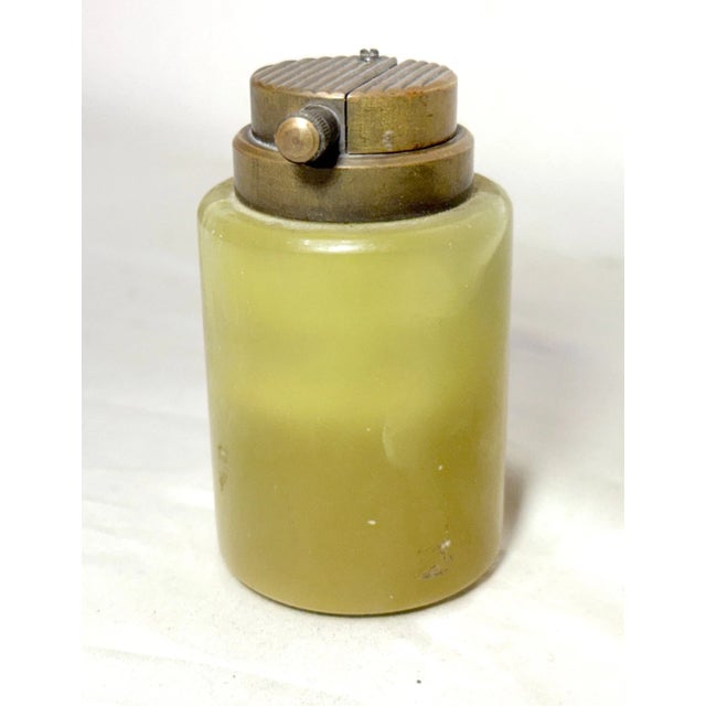 The rare antique carved green onyx stone and bronze table cigar lighter by Knapp is a high-quality collectible piece with...