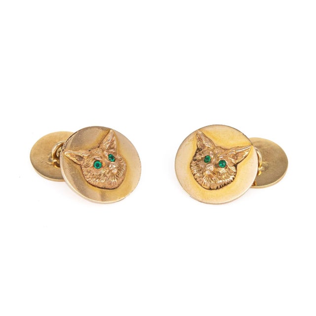 Finely detailed pair of vintage J.E. Caldwell cufflinks (circa 1920s to 1930s), crafted in 14k yellow gold. Emeralds are...