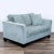 Features gently flared arms, loose cushions and a dark wood base. Brand: Jonathan Louis. Dimensions (in): 64W x 38D x 27H.