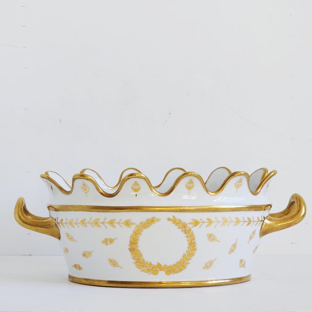 Chelsea House porcelain cachepot or wine cooler featuring, scalloped edges, hand gilded wreath and leaf motifs. The...