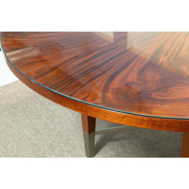 A vintage Greg Sheres Italian mahogany Verite Collection dining table. This is a stunning dining table designed by Greg...