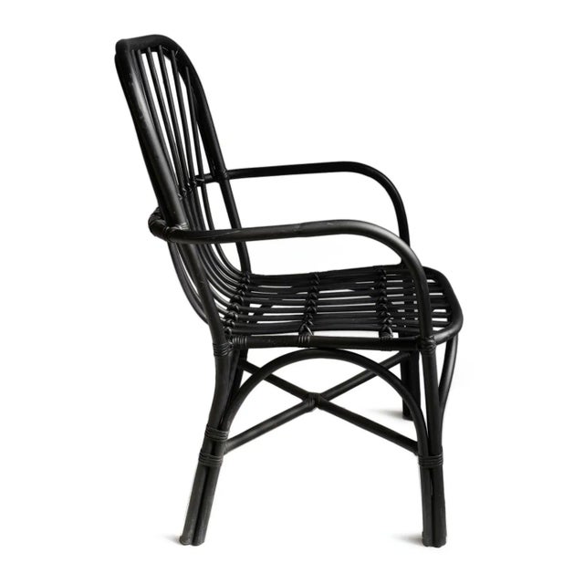 Simple black bamboo and rattan dining chair. Can be used outdoors (under covered area recommended) or indoors. Seat height...
