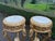 This elegant matching pair of late 20th-century French Louis XVI–style pedestal side tables combines sculptural giltwood...