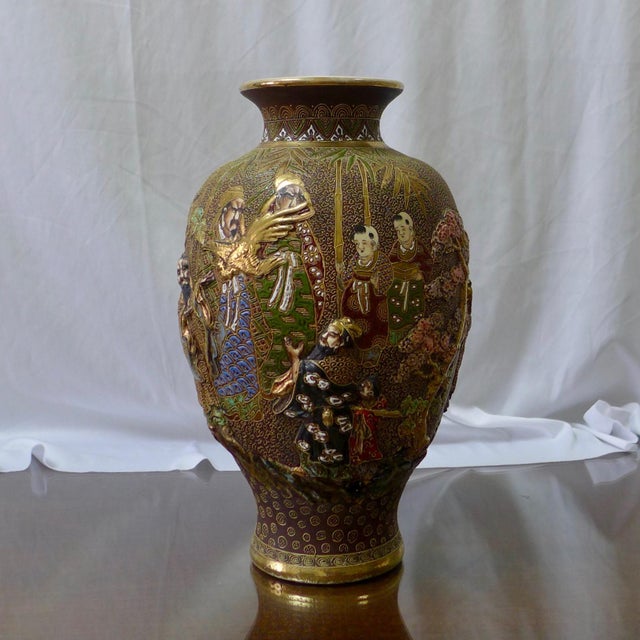 On offer is an exceptional antique Japanese Satsuma Moriage Vase. The modeled, raised figures and detailing, coloring, and...