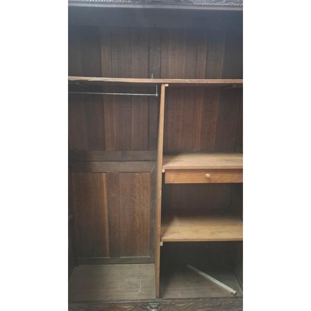 A Norman-style bedroom set comprising a 19th-century wedding wardrobe, a 20th-century bed (1.40m wide), and two 20th-...