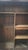 A Norman-style bedroom set comprising a 19th-century wedding wardrobe, a 20th-century bed (1.40m wide), and two 20th-...