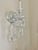 Shimmering and glimmering these crystal sconce chandeliers are the perfect addition to any room where elegance and sparkle...