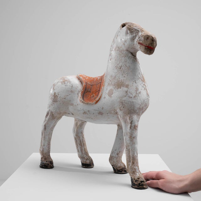 A decorative sculpture of a horse made in France circa 1900. A simple, crested saddle rests upon this lovely patinated...