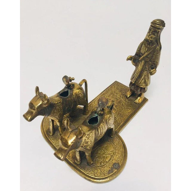 Early 20th Century Brass Hindu Temple Oil Lamps Figures a Two Cows and Holly Man Standing For Sale - Image 5 of 13
