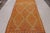 Hand knotted in wool originating from Morocco circa 1950-1960, this vintage mid-century Moroccan rug hails from the Berber...